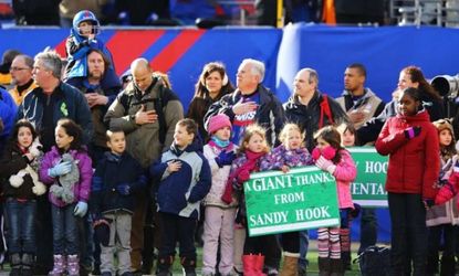 Newtown families were invited onto the field before a New York Giants game on Dec. 30.
