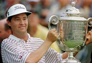 Davis Love III holds the Wanamaker Trophy