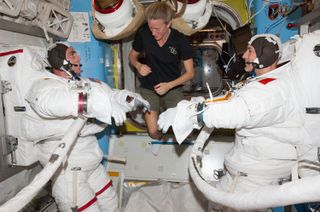 Astronauts Prepare for Spacewalk