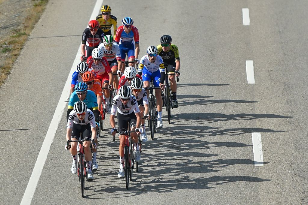 The pack competes in the 5th stage of the 2020 La Vuelta cycling tour of Spain a 1844km race from Huesca to Sabinanigo on October 24 2020 Photo by ANDER GILLENEA AFP Photo by ANDER GILLENEAAFP via Getty Images