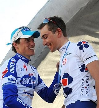 Sylvain Chavanel (Quick Step) congratulates Roy on his way up to get the yellow jersey.