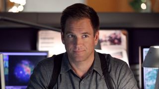 Michael Weatherly's Tony DiNozzo seated at his desk in NCIS