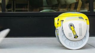 Star Wars G1T4-M1N1 Droid on a pavement