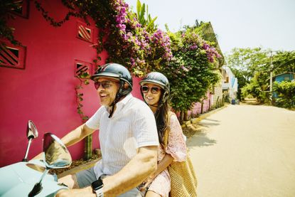 Couple on a Vespa 