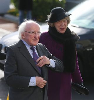 President Michael D Higgins and his wife Sabina at the funeral of late actor Frank Kelly