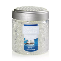 Life's A Breeze Fragrance Spheres: $6.25 $3.50 | Yankee Candle
Yankee Candle fragrance spheres emit room-filling scent for up to 30 days. Add this one to your home and you'll feel as if you're chilling at the beach on a breezy day. It has top notes of bergamot and sea air accord, with a middle of lavender and oakmoss plus a patchouli base.  