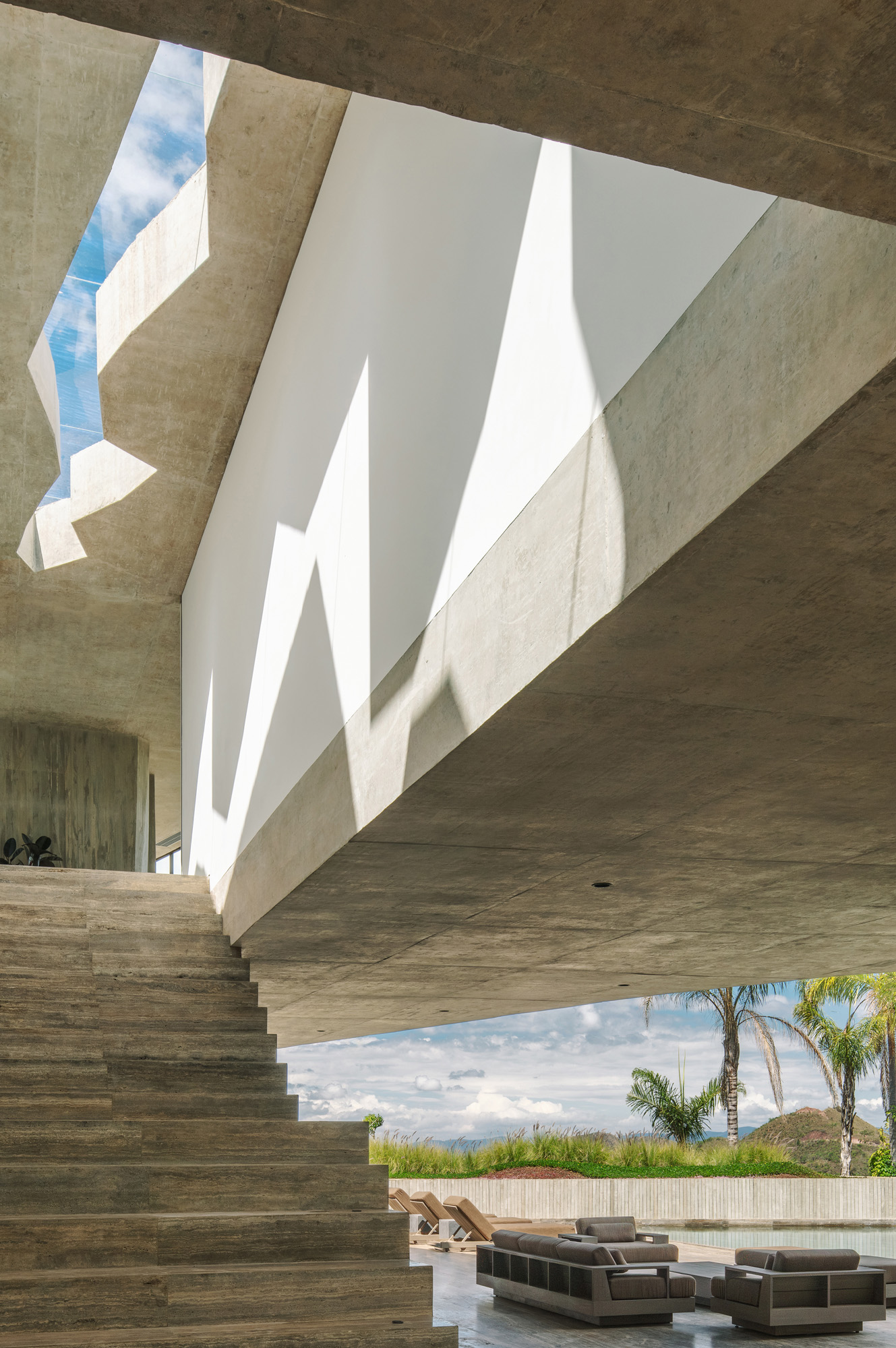 Xingu House, a concrete and stone brazilian home in Minas Gerais