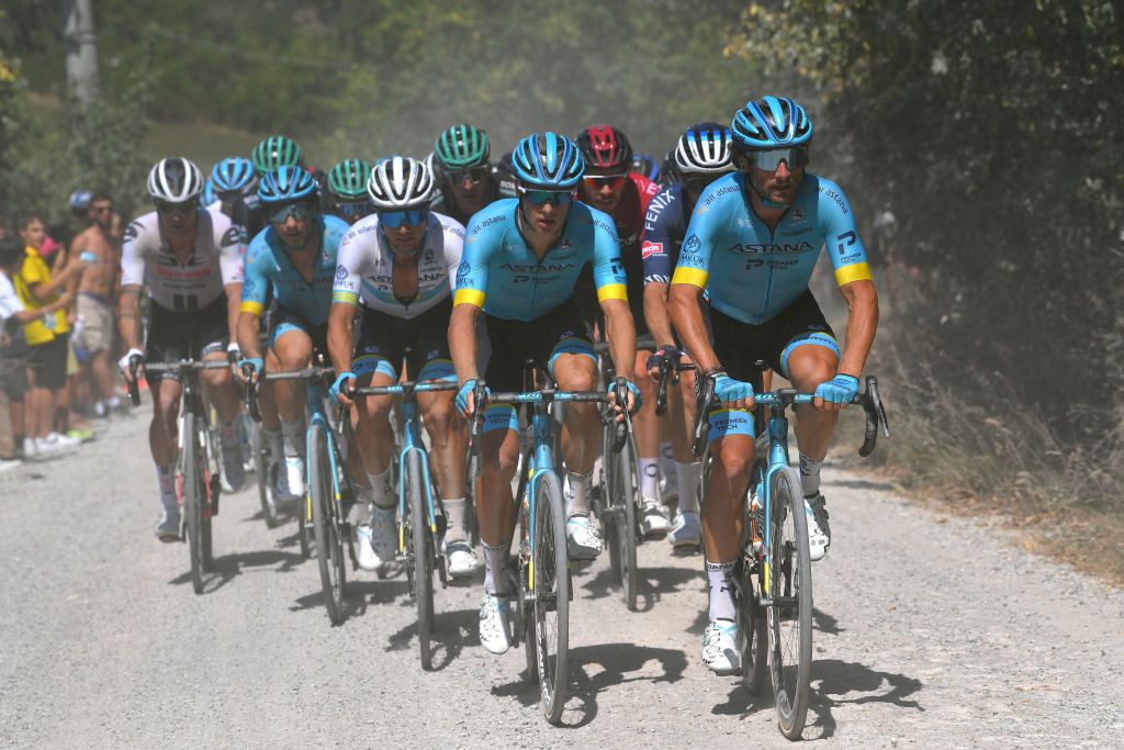 SIENA ITALY AUGUST 01 Manuele Boaro of Italy and Astana Pro Team Jakob Fuglsang of Denmark and Astana Pro Team Alexey Lutsenko of Kazakhstan and Astana Pro Team Dust Gravel Strokes during the Eroica 14th Strade Bianche 2020 Men a 184km race from Siena to SienaPiazza del Campo StradeBianche on August 01 2020 in Siena Italy Photo by Tim de WaeleGetty Images