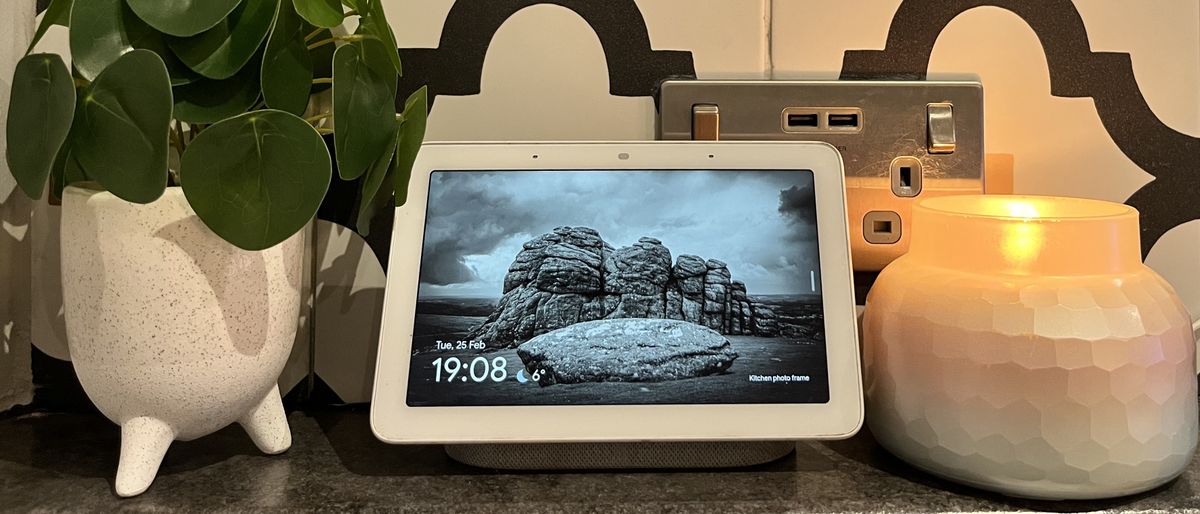 Google Nest Hub used as digital photo frame showing black and white landscape