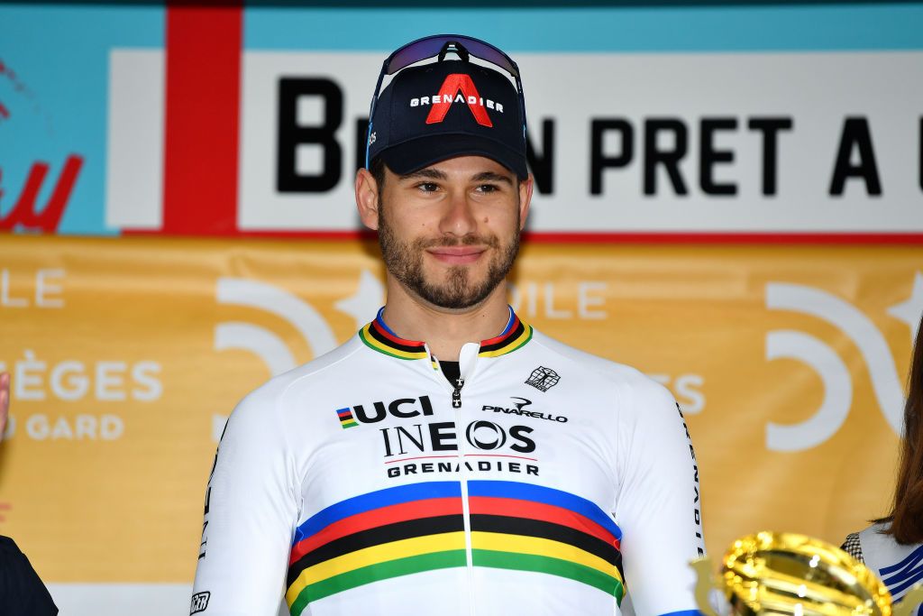 ALES FRANCE FEBRUARY 06 Filippo Ganna of Italy and Team INEOS Grenadiers celebrates winning the at stage on the podium ceremony after the 52nd toile De Bessges Tour Du Gard 2022 Stage 5 a 11km individual time trial from Als to Als lErmitage ITT EDB2022 on February 06 2022 in Als France Photo by Luc ClaessenGetty Images