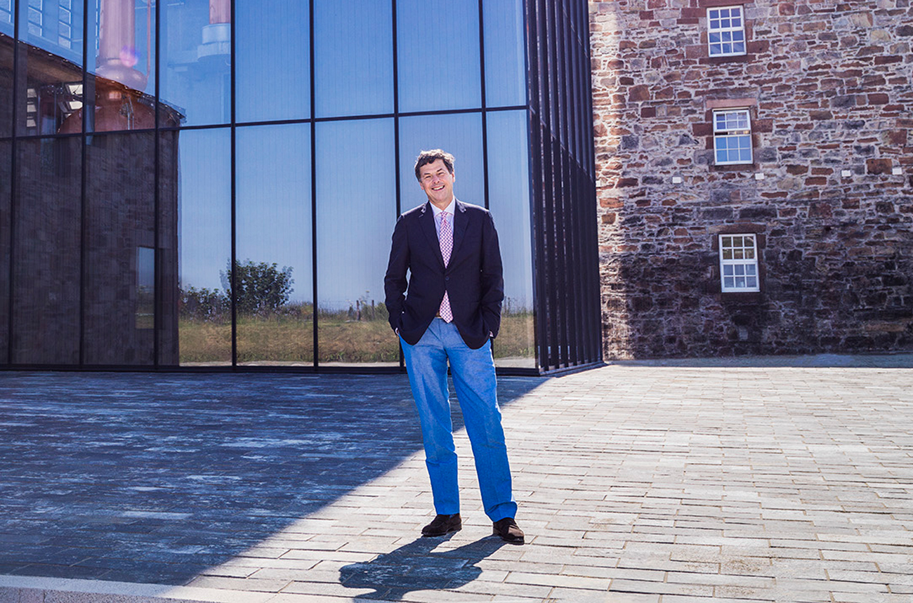 Dr Bill Lumsden standing outside the Glenmorangie Lighthouse distillery