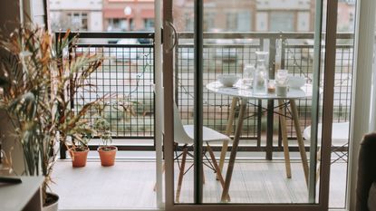 Balcony with table and plants