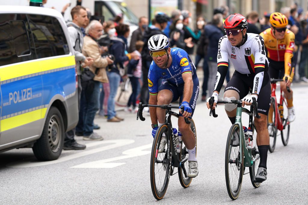 NUREMBERG GERMANY AUGUST 29 LR Mark Cavendish of United Kingdom and Team Deceuninck QuickStep and John Degenkolb of Germany and Team Germany prepare for the race prior to the 35th Deutschland Tour 2021 Stage 4 a 1563km stage fro Erlangen to Nrnberg DeineTour on August 29 2021 in Nuremberg Germany Photo by Christian KasparBartkeGetty Images