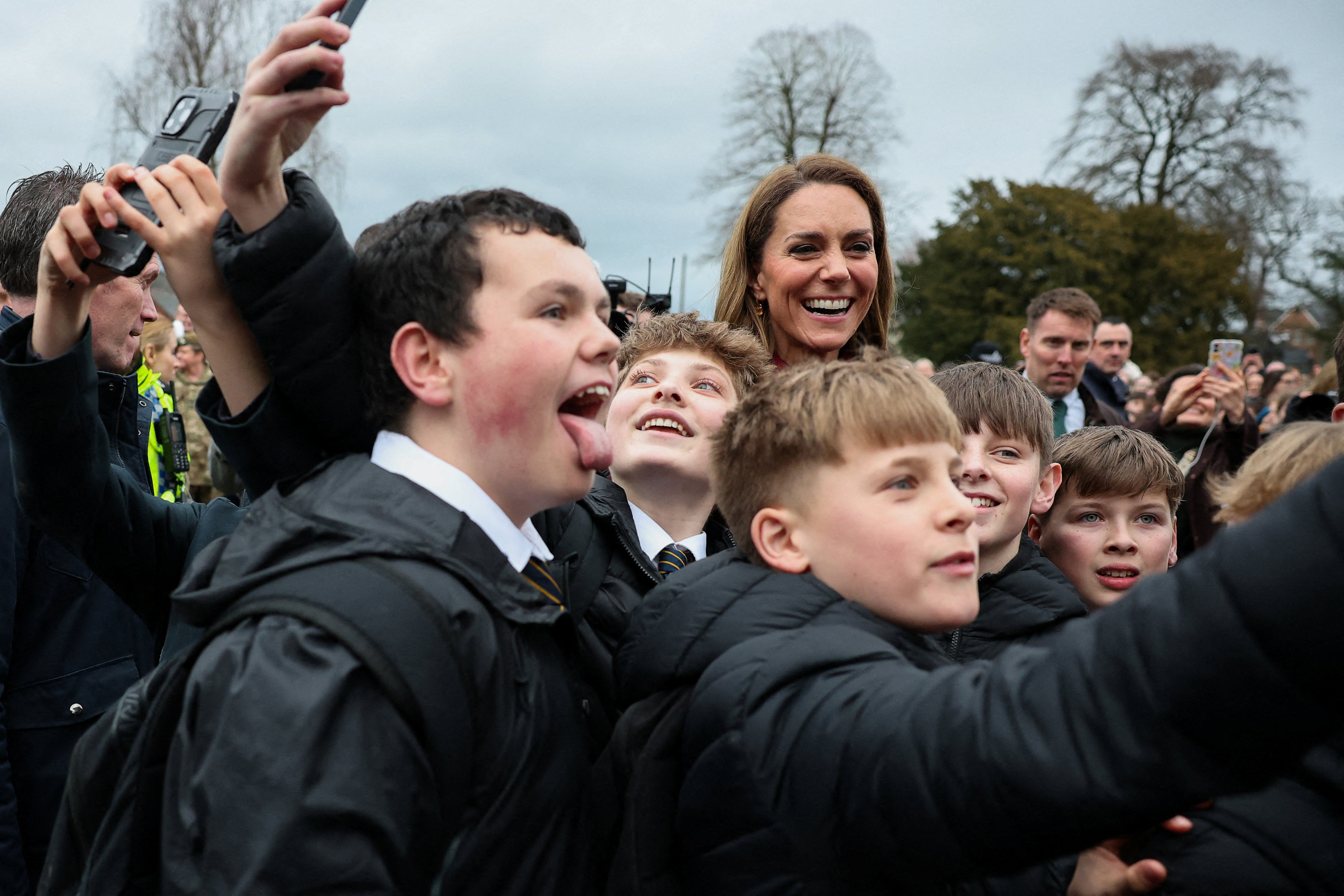 Princess Kate taking a selfie with a group of boys
