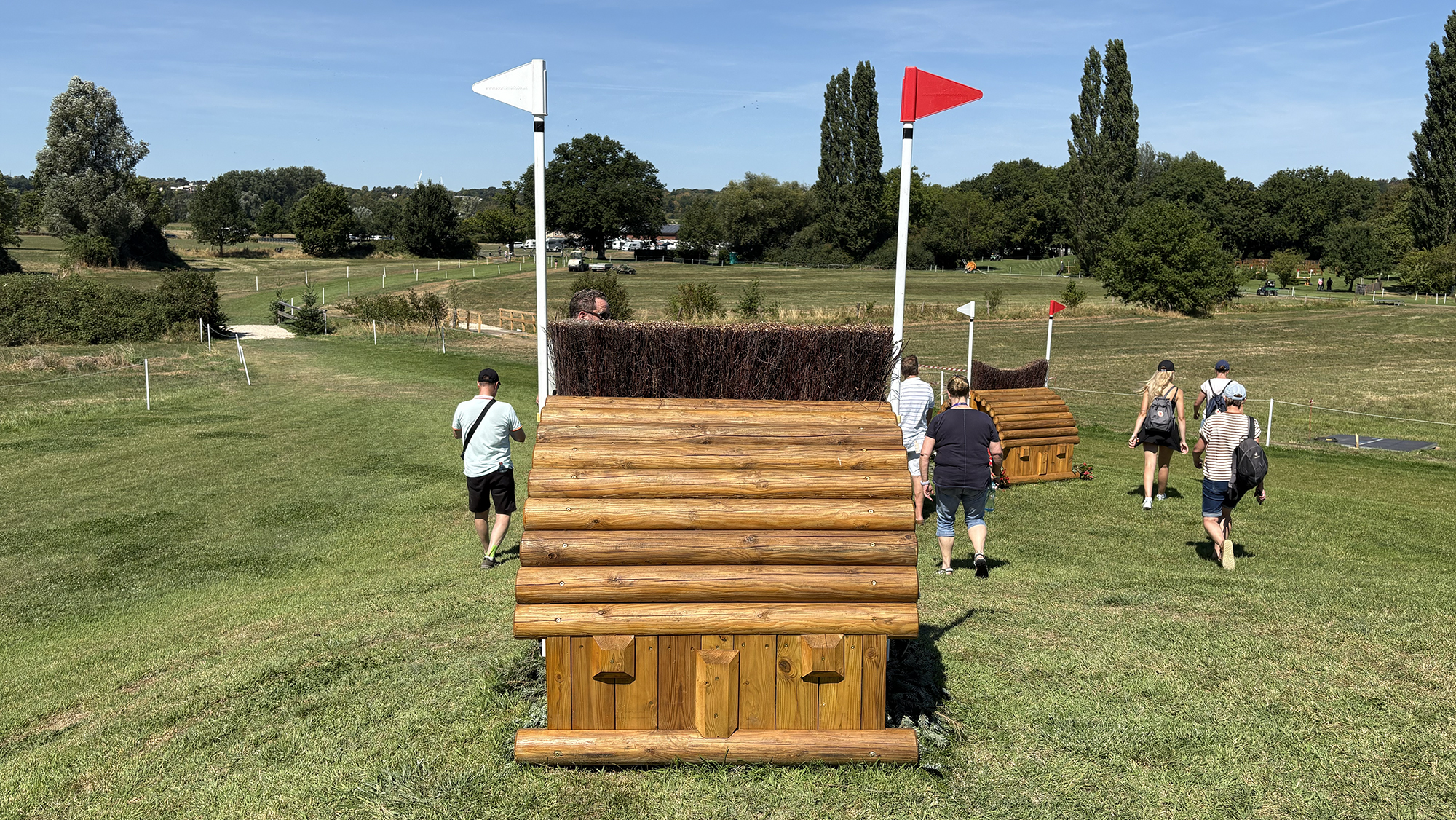A narrow fence with brush on the top of it on the eventing World Championships cross-country course