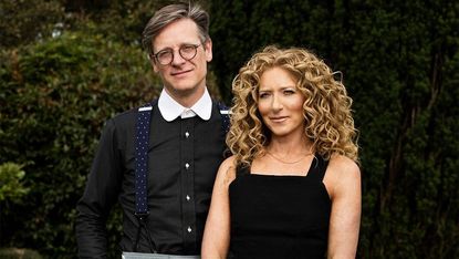 kelly hoppen and daniel hopwood on grass field