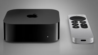 The Apple TV 4K 2022 with its remote on a grey background