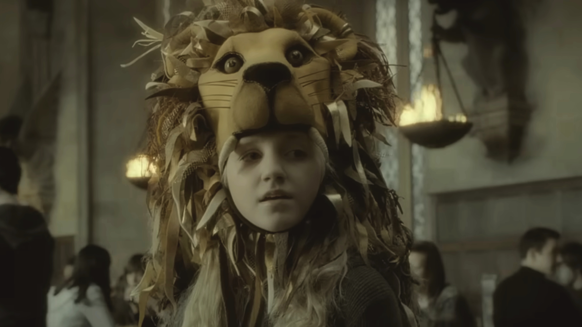 Luna Lovegood (Evanna Lynch) speaks to her classmates in Harry Potter and the Half-Blood Prince.