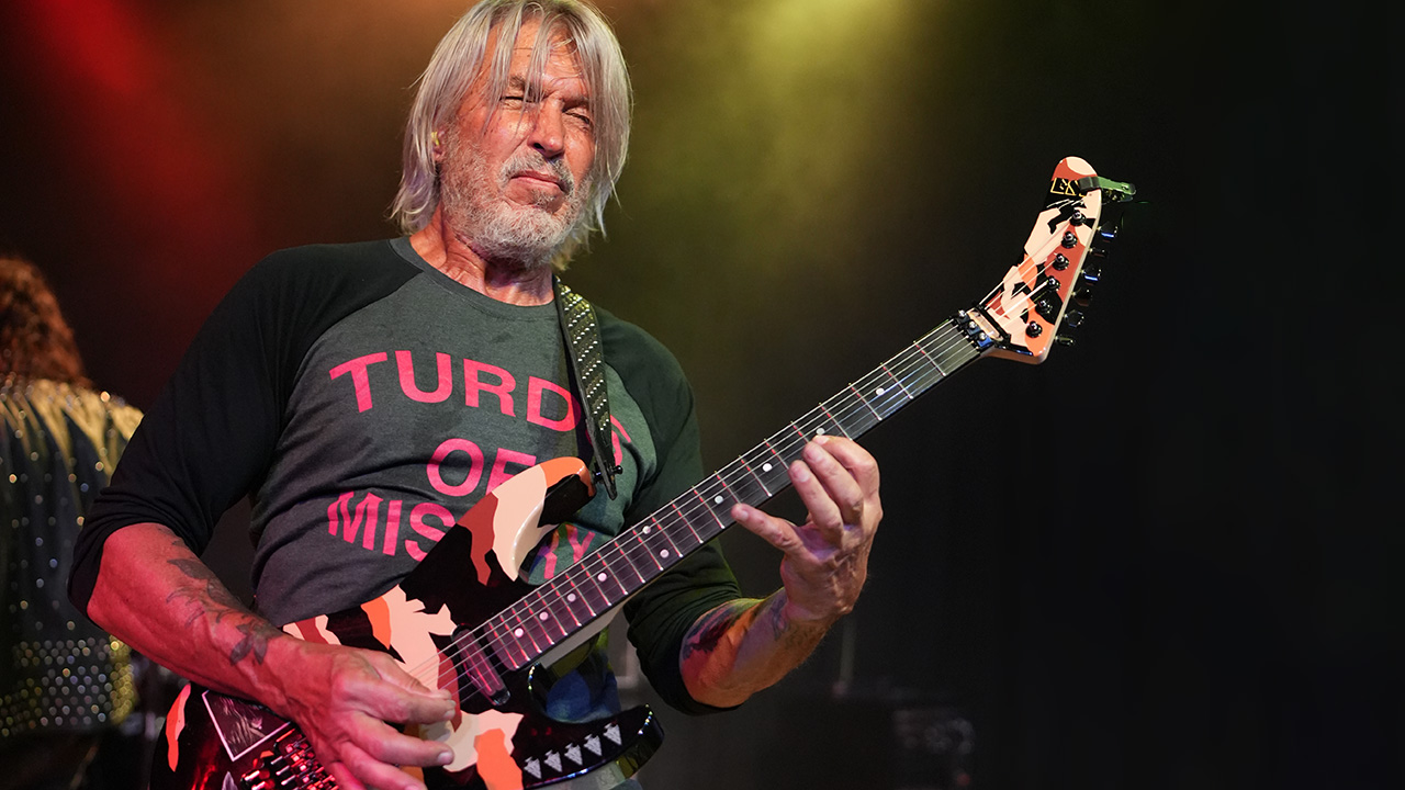 George Lynch performs onstage