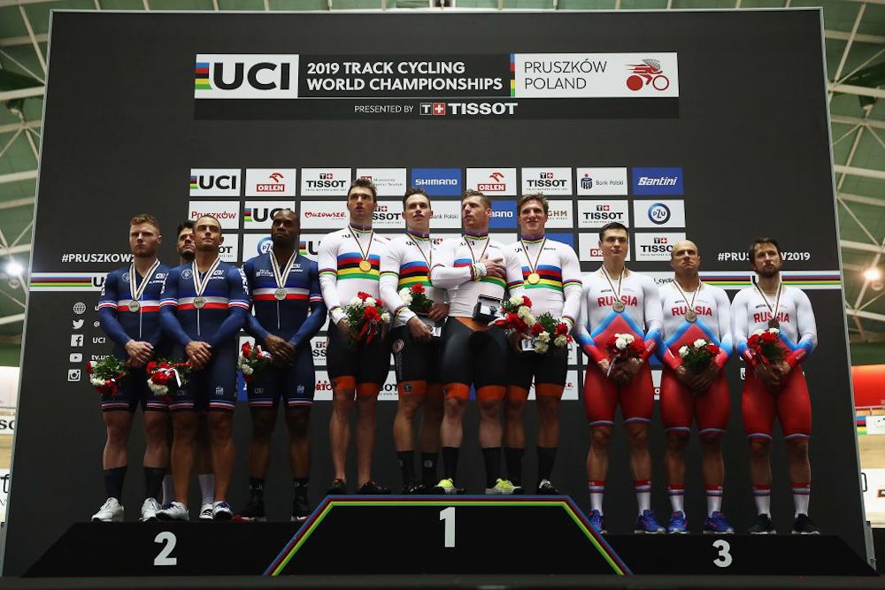 Gregory Bauge, Sebastien Vigier and Quentin Lafargue of France (Silver Medal), Matthijs Buchli, Roy van den Berg, Harrie Lavreysen and Jeffrey Hoogland of the Netherlands (Gold Medal) and Alexander Sharapov, Denis Dmitriev and Pavel Yakushevskiy of Russia (Bronze) pose on the podium for the Men's team sprint final on day one of the UCI Track Cycling World Championships