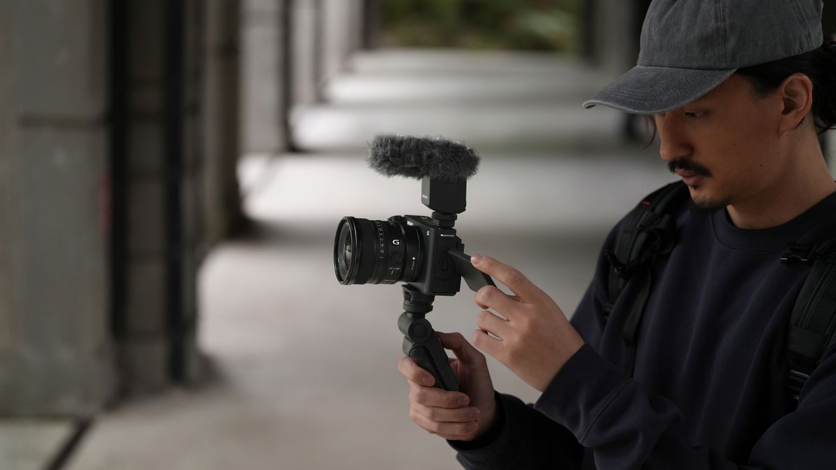 The Sony FE 16mm f/1.8 G used by a person