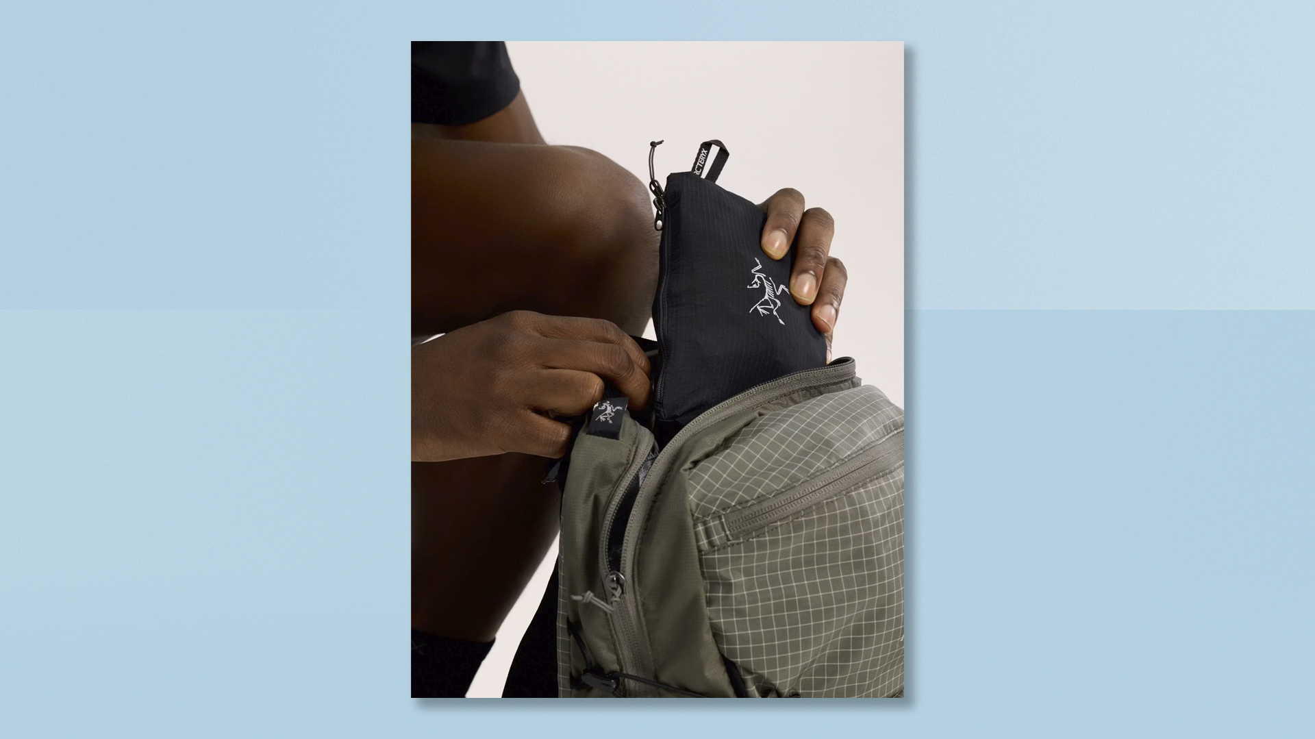 Arc'teryx Ossa 1/2 Zip Hoodie on colourful background