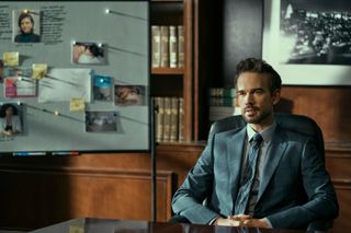 Christopher Gorham as Trevor Elliot, sitting in an office, in episode 109 of The Lincoln Lawyer.