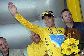 No longer 'Grim Kim', Kirchen couldn't help by smile after getting the yellow jersey.