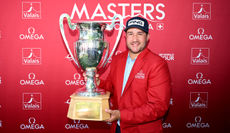 Thriston Lawrence holds the Omega European Masters trophy