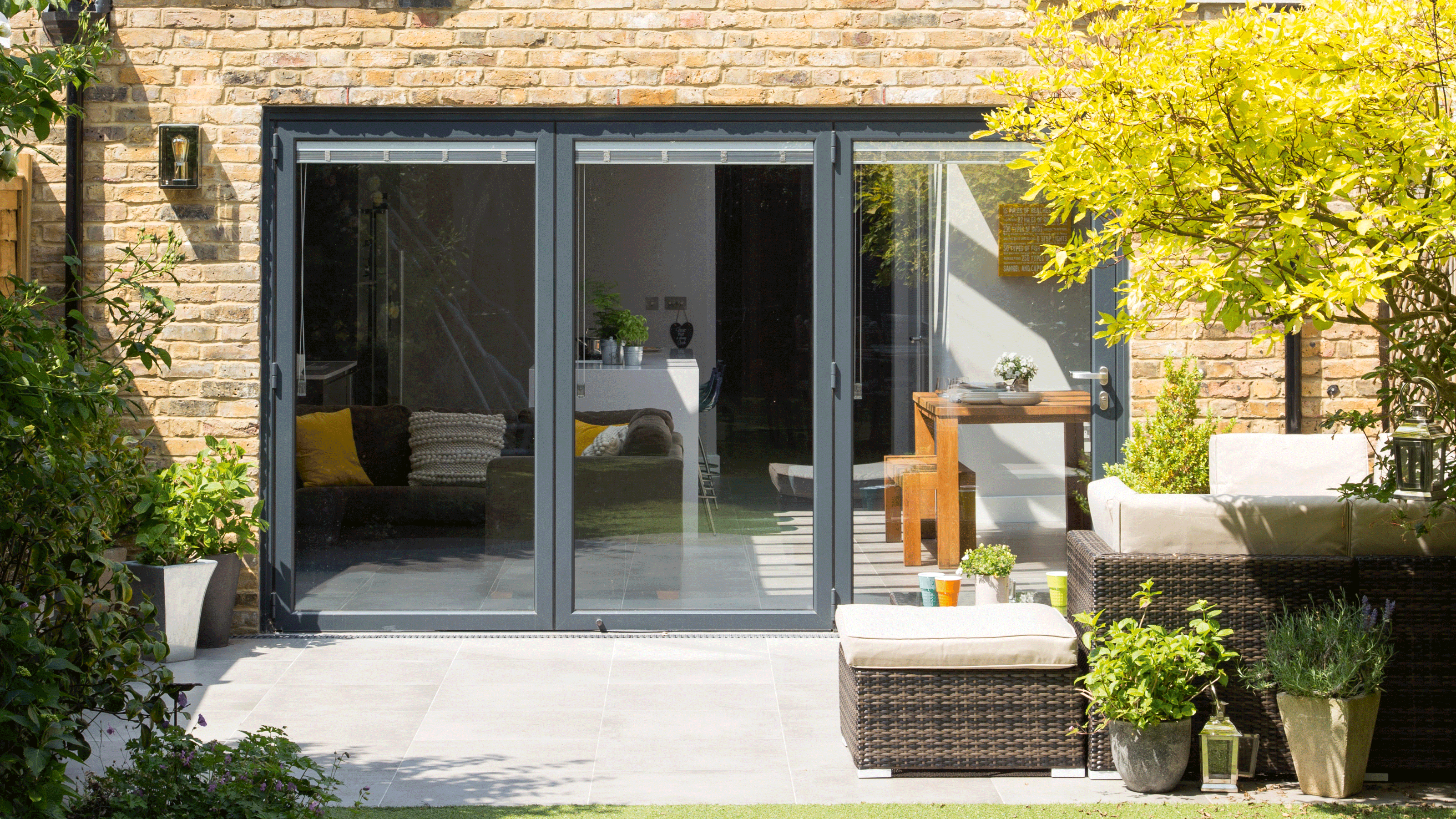 Glass sliding doors overlooking garden patio