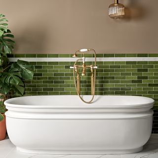 Bathroom tile trends with green tiles behind bath