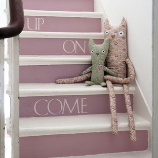 white and tale pink steps of staircase