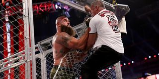 Braun Strowman pulls Shane McMahon through the cage at WrestleMania 37