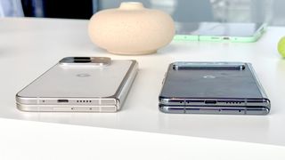 Google Pixel 9 Pro Fold next to Pixel Fold folded on table