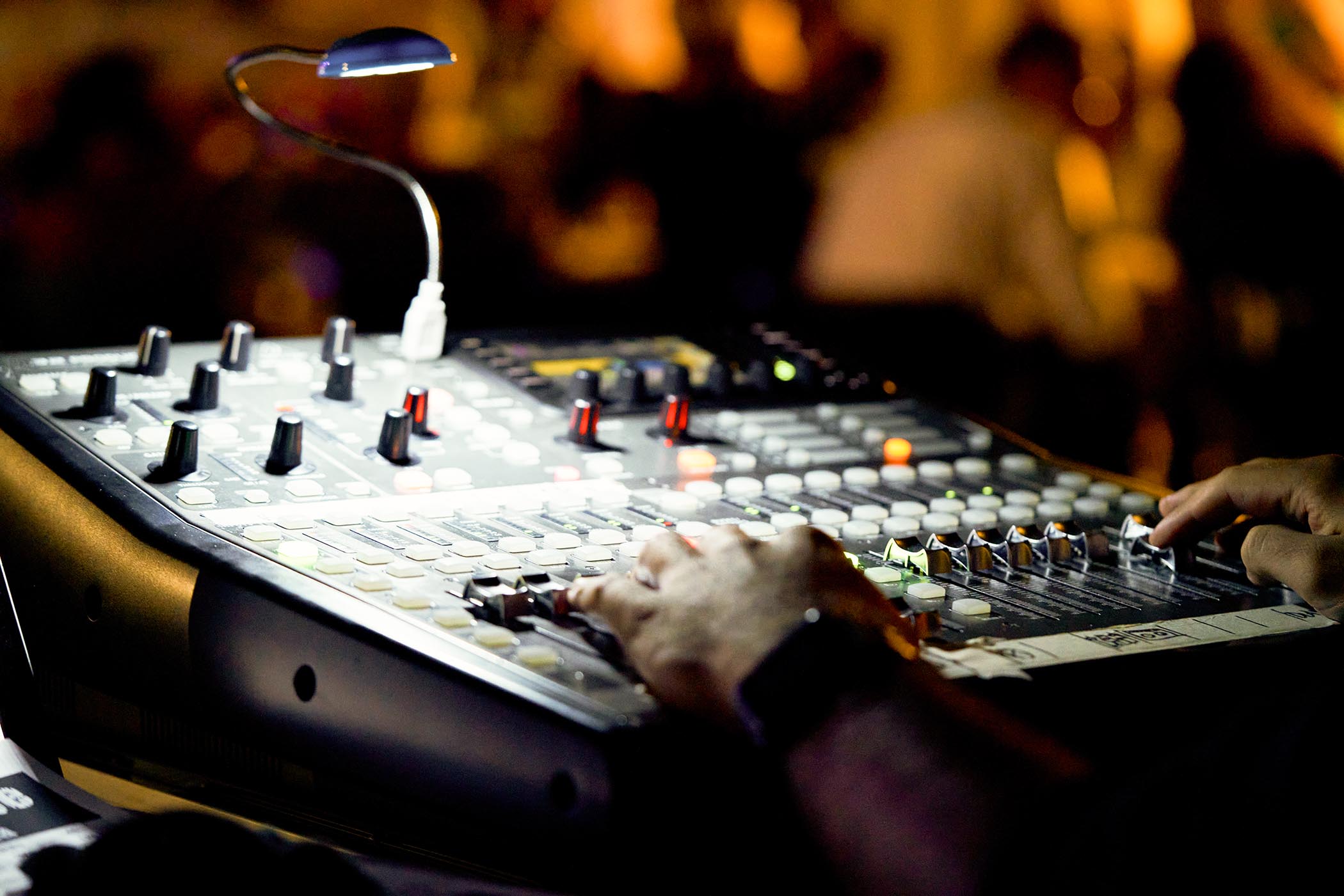 A close-up of a mixing desk during a live gig: Most modern venues provide engineers with multiple mixer channels and mics &amp;ndash; which can cause complications.