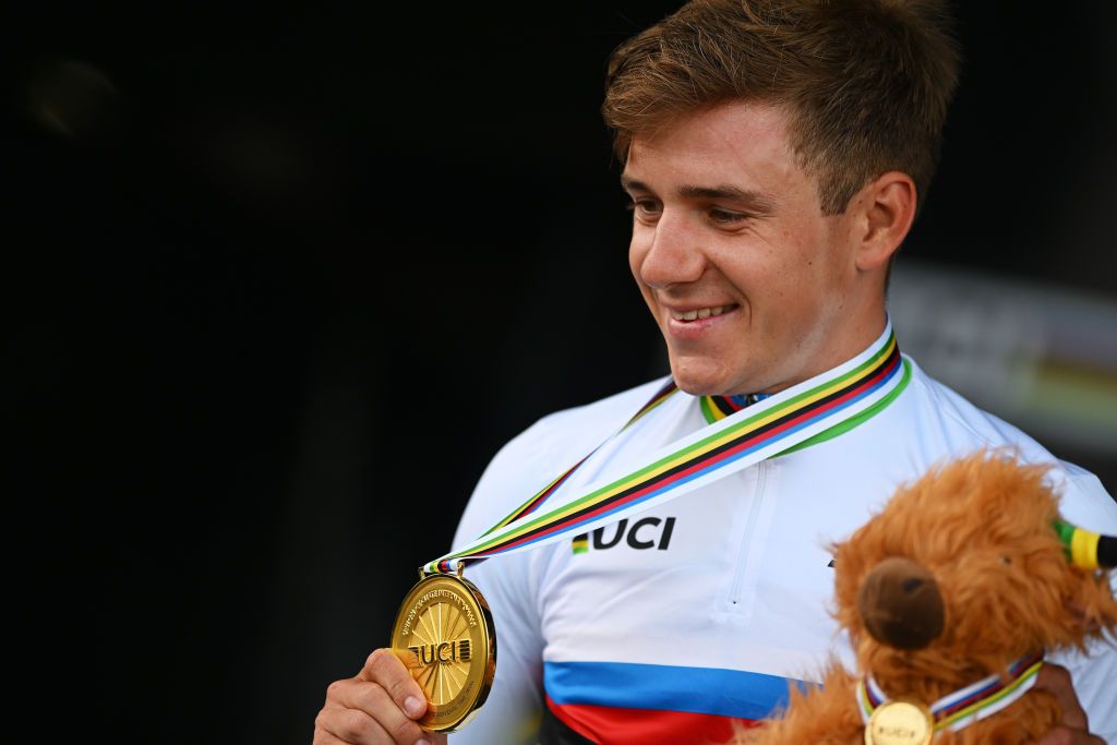 STIRLING SCOTLAND AUGUST 11 Gold medalist Remco Evenepoel of Belgium celebrates winning during the medal ceremony after the Men Elite Individual Time Trial a 478km race from Stirling to Stirling at the 96th UCI Cycling World Championships Glasgow 2023 Day 9 UCIWT on August 11 2023 in Stirling Scotland Photo by Dario BelingheriGetty Images