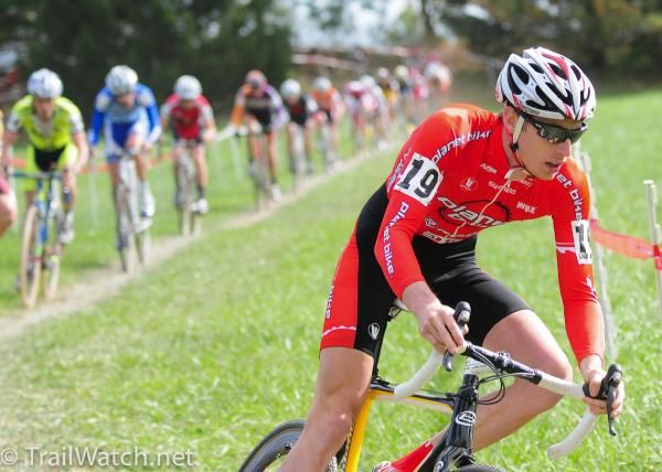 Tristan Schouten (Planet Bike) in a long train of riders on lap one