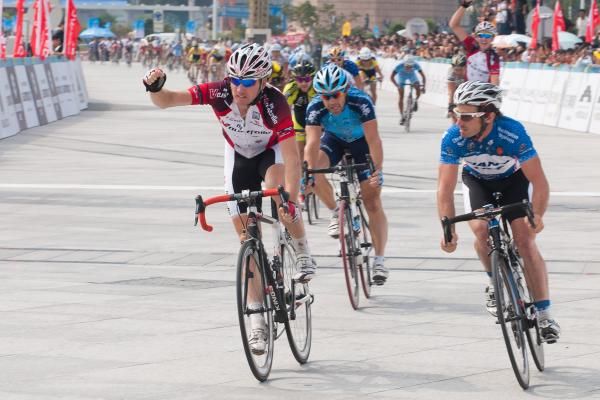 Stage winner Aaron Kemps takes his second stage of this year's Tour of China.