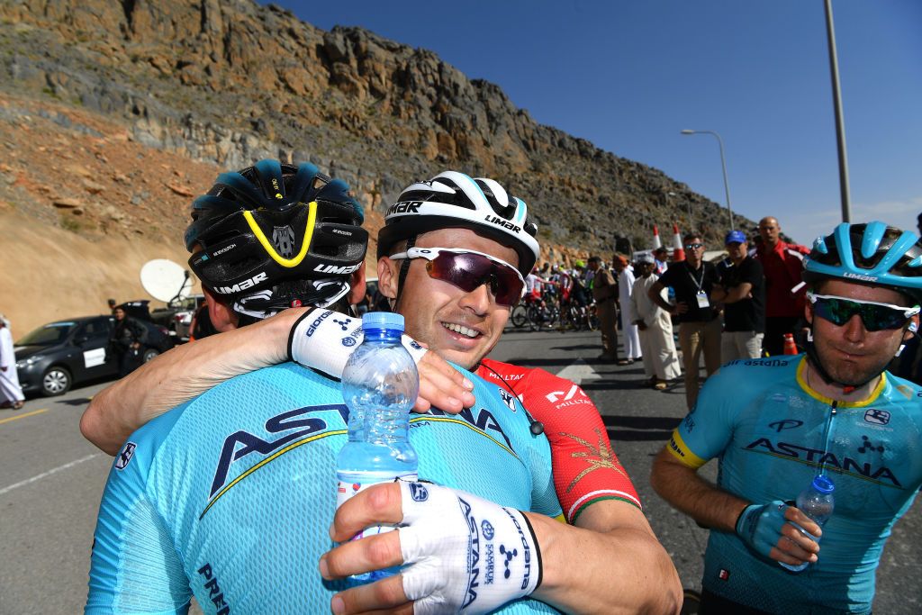 Alexey Lutsenko celebrates his win with his teammates