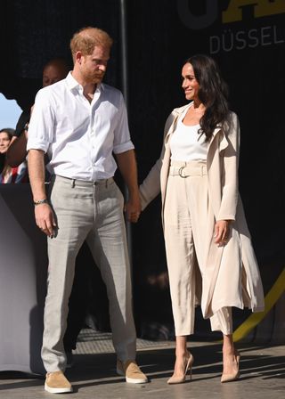 DUSSELDORF, GERMANY - SEPTEMBER 16: Prince Harry, Duke of Sussex and Meghan, Duchess of Sussex attend the swimming medal ceremony during day seven of the Invictus Games Düsseldorf 2023 on September 16, 2023 in Dusseldorf, Germany. (Photo by Karwai Tang/WireImage)