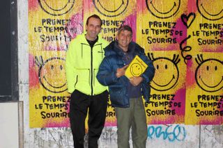 Smiley CEO Nicolas Loufrani (left) and André Savaiva during the anniversary fly poster campaign in Paris