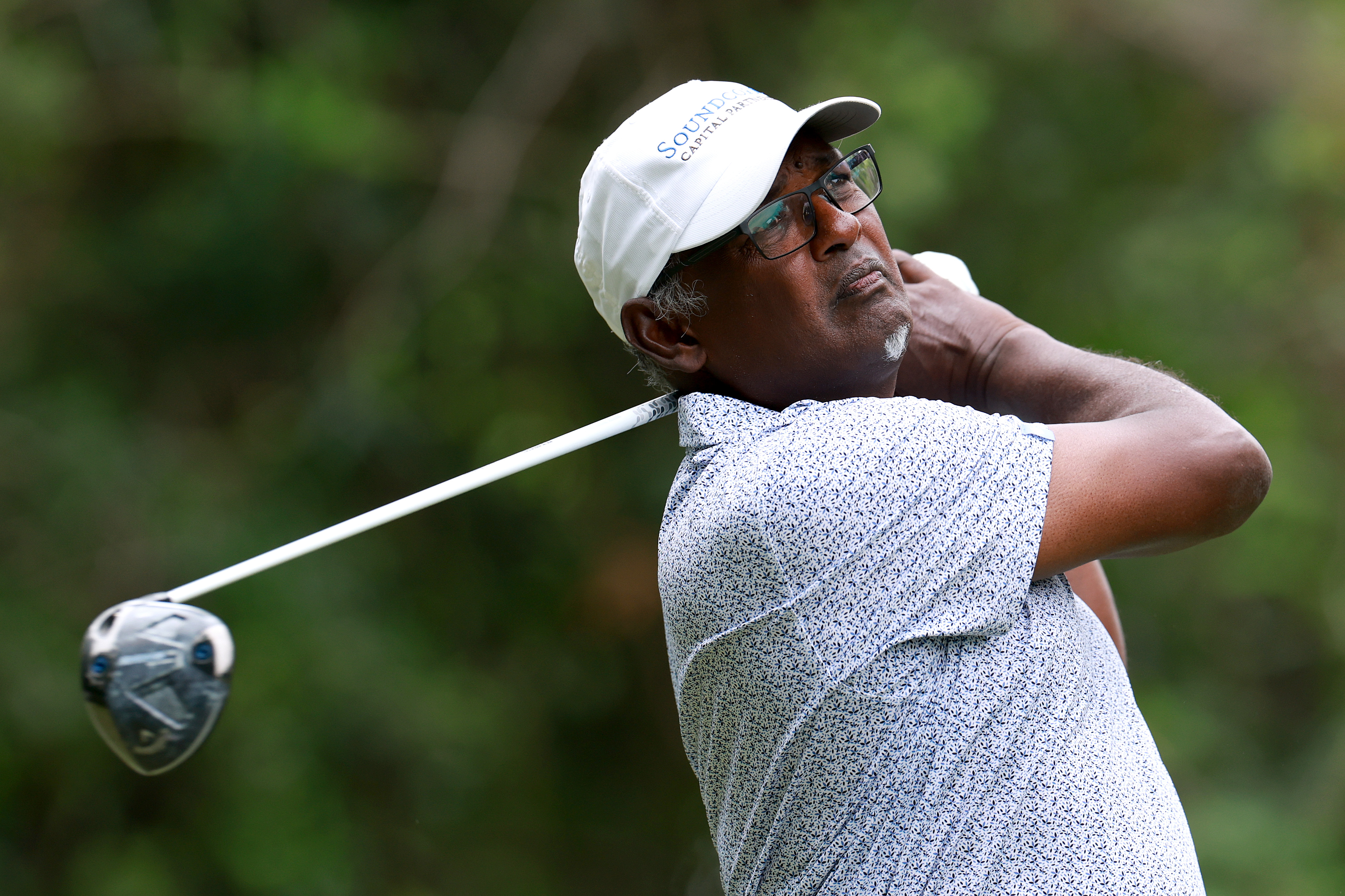 Vijay Singh plays a shot on the fifth tee during the first round of the Insperity Invitational
