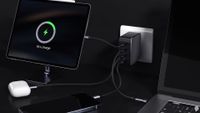 The Ugreen Nexode 100W GaN charger plugged with multiple devices