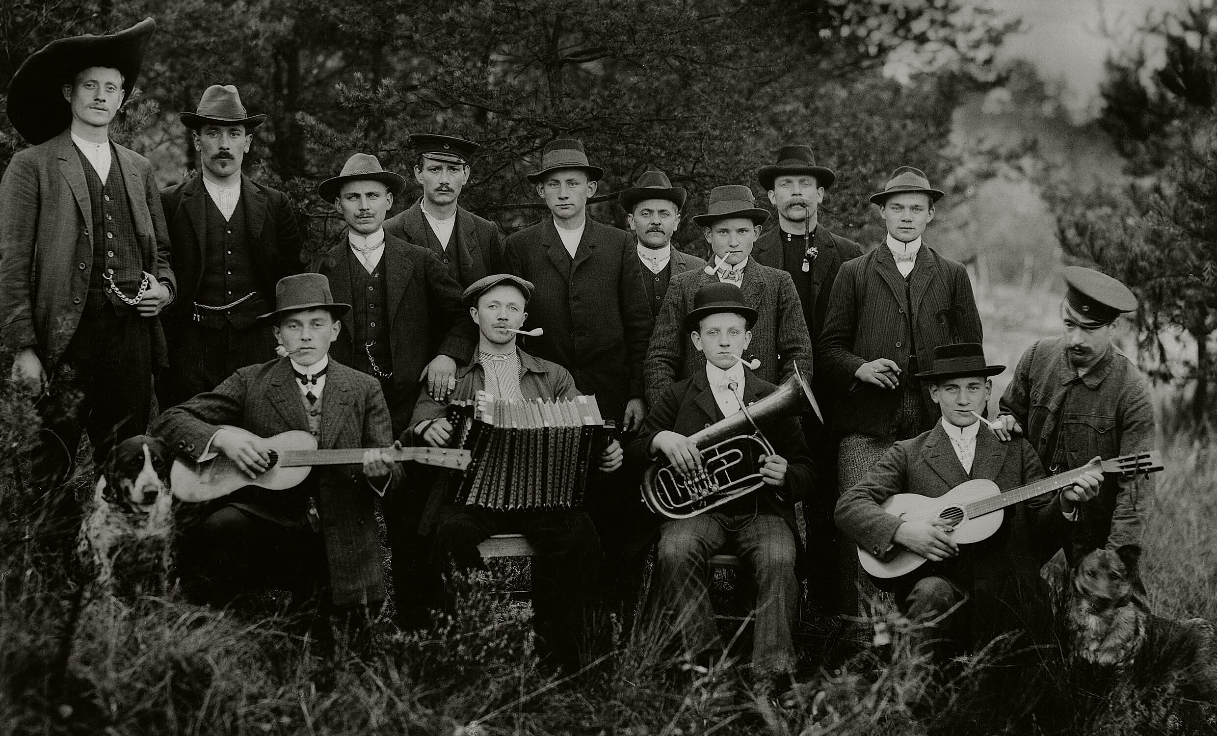 August Sander: Group of Farmers with Musicians, 1912