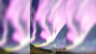 Extremely rare pink auroras temporarily filled the skies above Norway after a crack in the Earth's magnetosphere enabled solar wind to penetrate deep into Earth's atmsopehre.