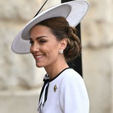 Kate Middleton wearing a white dress by jenny packham for trooping the colour