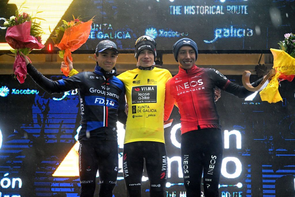 ALTO DE SAN XIAO MONTE ALOIA SPAIN FEBRUARY 25 LR Lenny Martinez of France and Team Groupama FDJ on second place race winner Jonas Vingegaard Hansen of Denmark and Team Visma Lease a Bike Yellow Leader Jersey and Egan Bernal of Colombia and Team INEOS Grenadiers on third place pose on the podium ceremony after the 3rd O Gran Camio The Historical Route 2024 Stage 4 a 110km stage from Ponteareas to Alto de San Xiao Monte Aloia 629m Stage shortened due to the adverse weather on February 25 2024 in Alto de San Xiao Monte Aloia Spain Photo by Dario BelingheriGetty Images