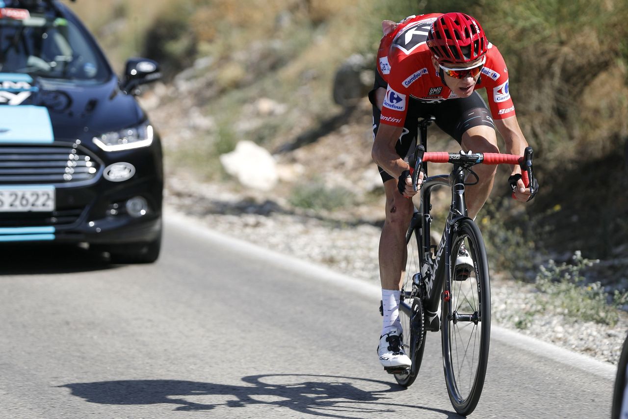Chris Froome (Sky) chasing after his crash