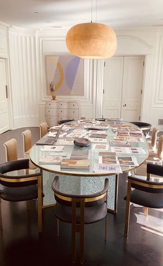 Kelly Wearstler repurposes her dining room table as her temporary office at home in Beverly Hills