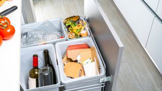 kitchen bins in concealed kitchen drawer for recycling and general household waste